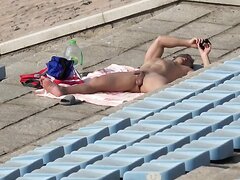 Chinese bodybuilder naked sunbathing