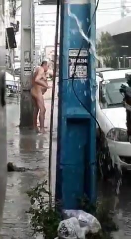 Naked fat dad showering naked on the street