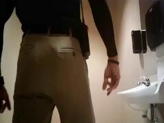 Guy butt flexing in private place
