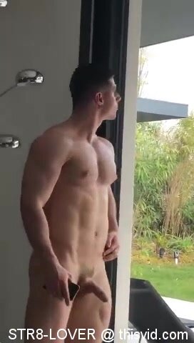 sexy naked hunk walking around in the house