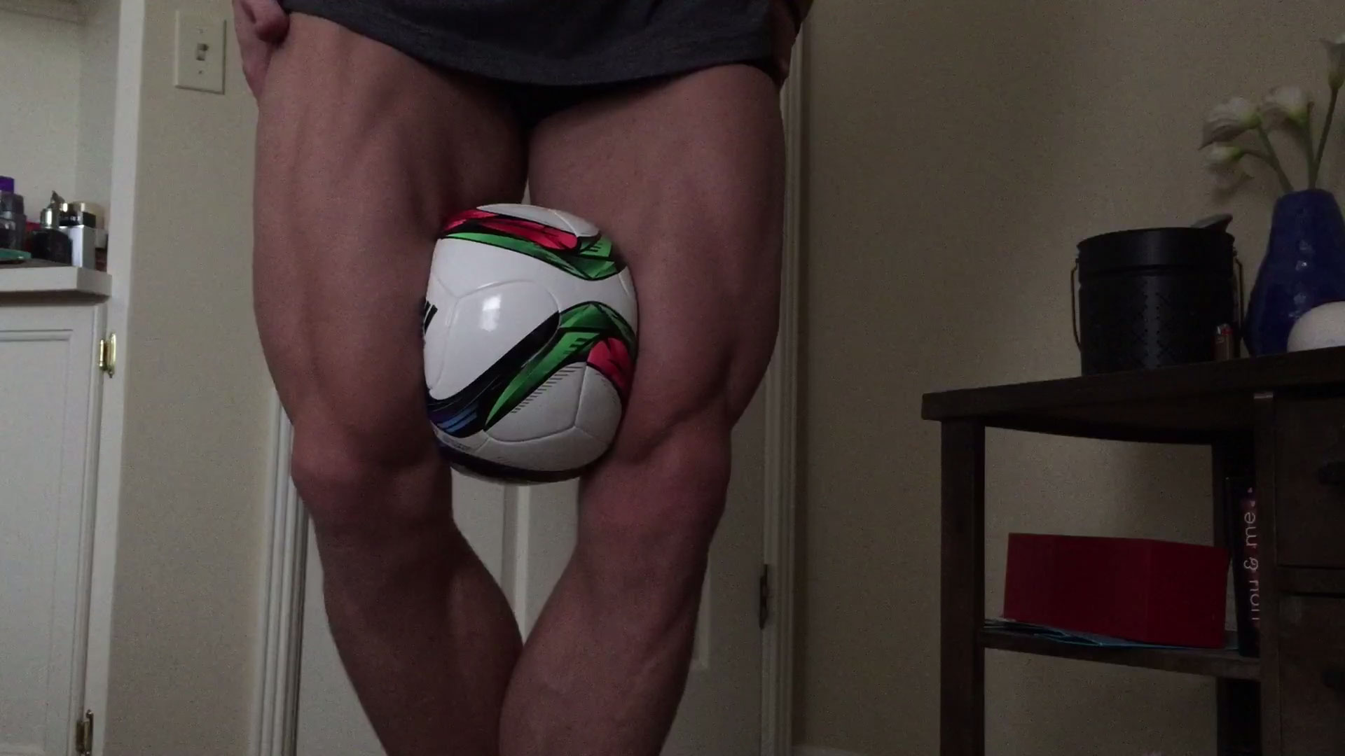 Muscular Legs Crush Soccer Ball