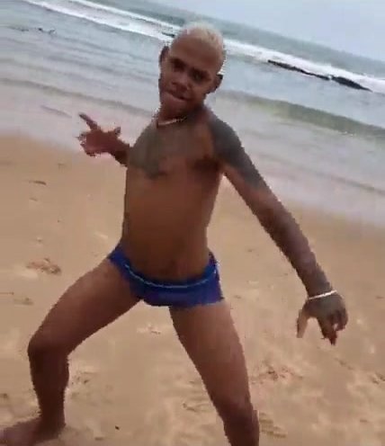brazilian god dancing on the beach