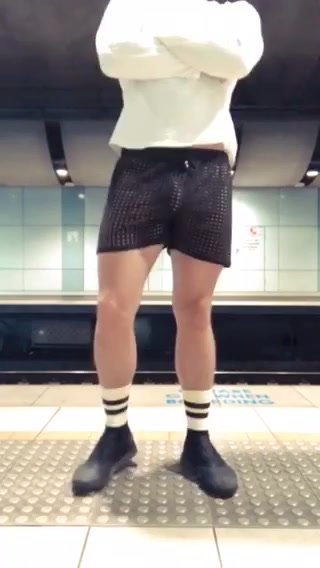 mesh shorts at train station