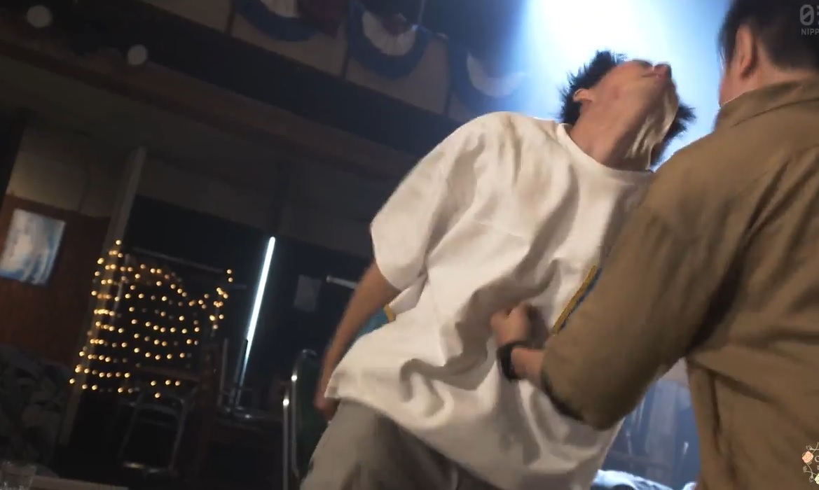 Two handsome boys  gut punch Fights