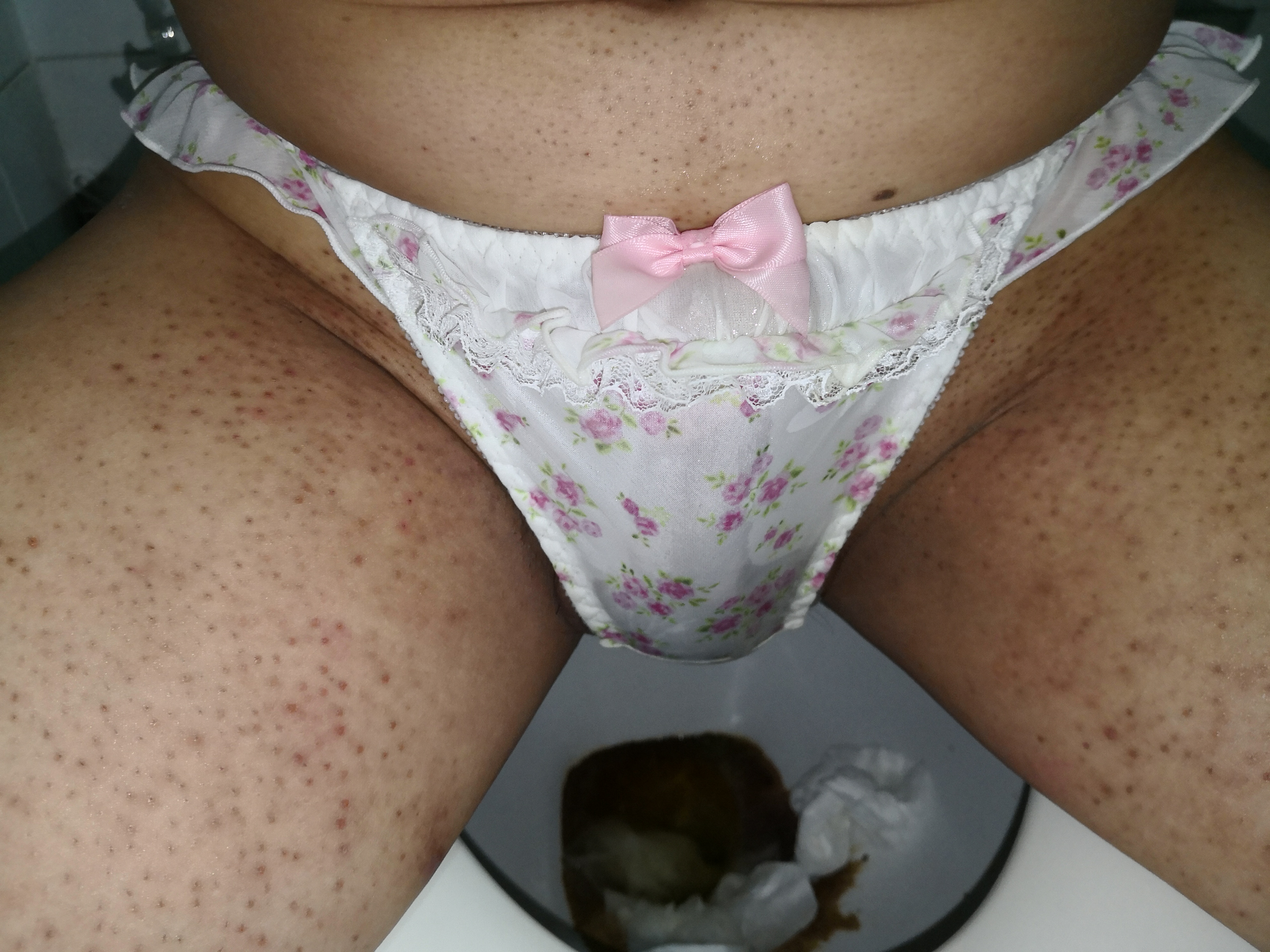 Wetting this lovely white flower pattern panty.