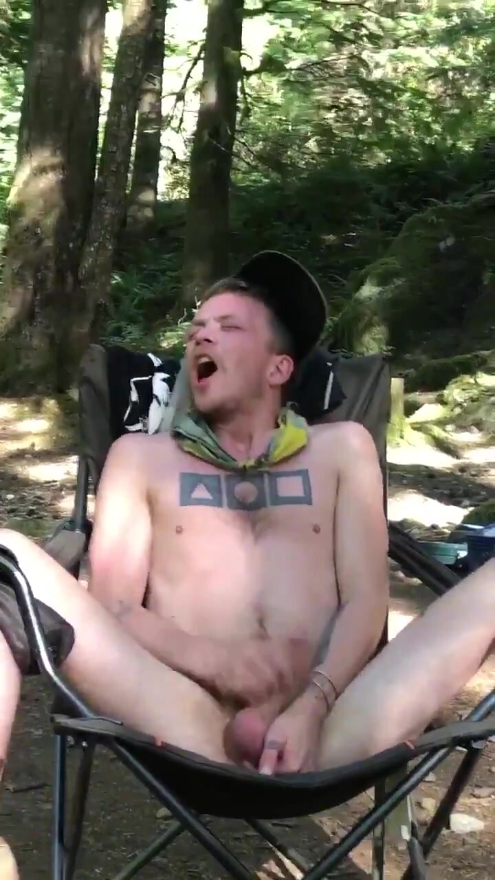 Tatted gooner bro spreads his legs out in the forest