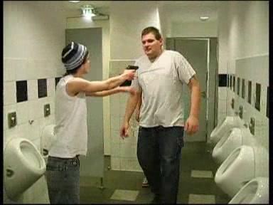 Thugs Attack Man in Public Bathroom