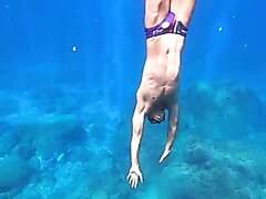 Paolo underwater in bulging speedo