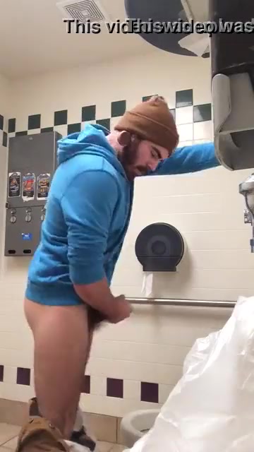Bearded hipster toilet cum