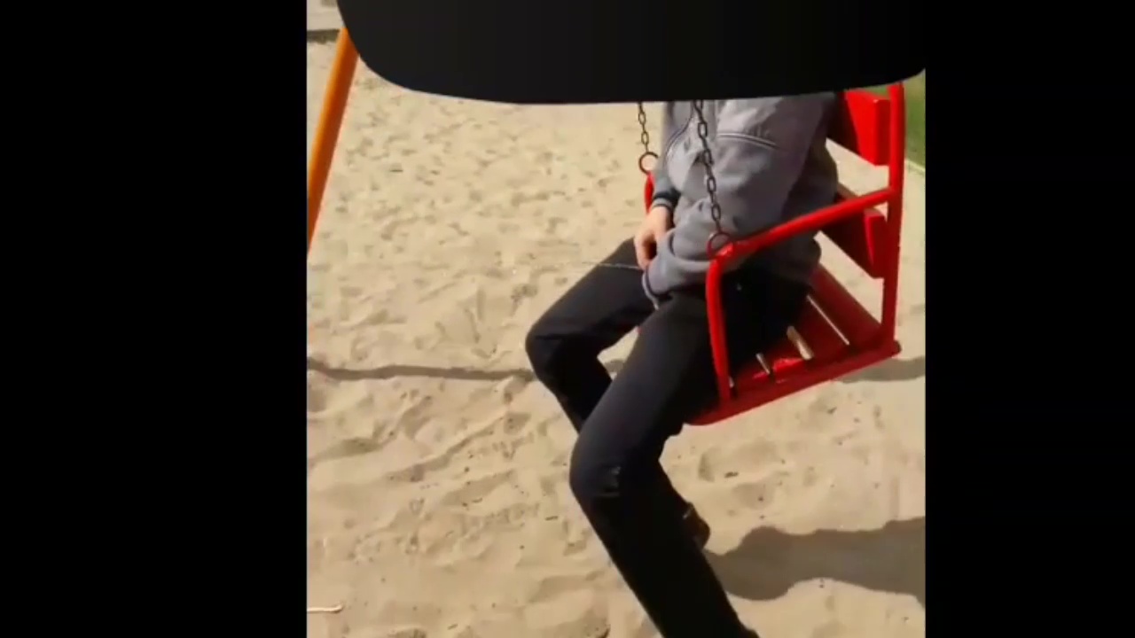 Guy on swing piss at playground