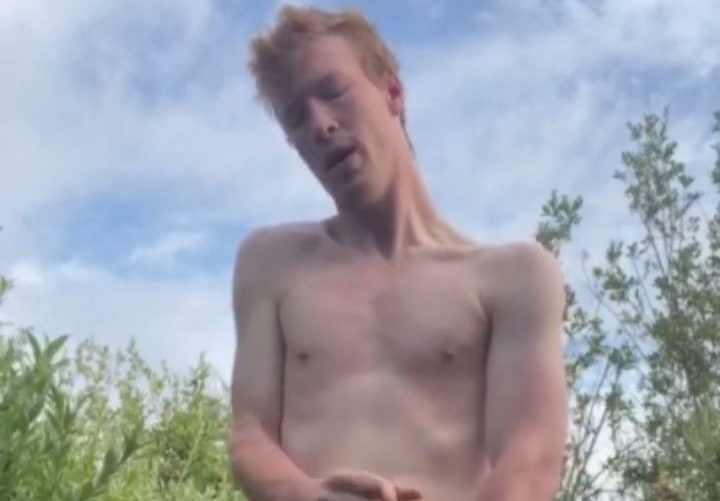 Tall thin ginger cumming in nature