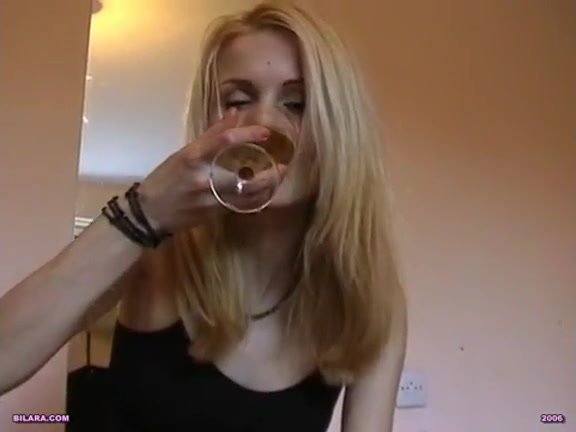 Blonde teen drinks a glass of her own fresh piss