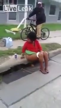 Black lady caught pooping in the streets