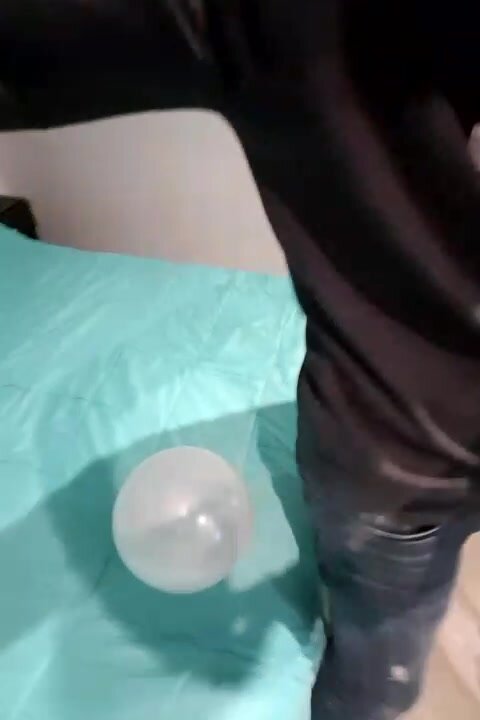 Skinny sits on balloon