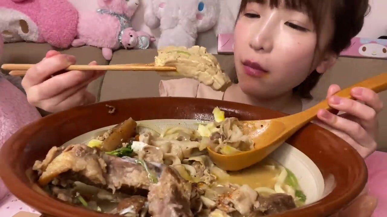 Asian Girl Swallows Whole piece of Tofu