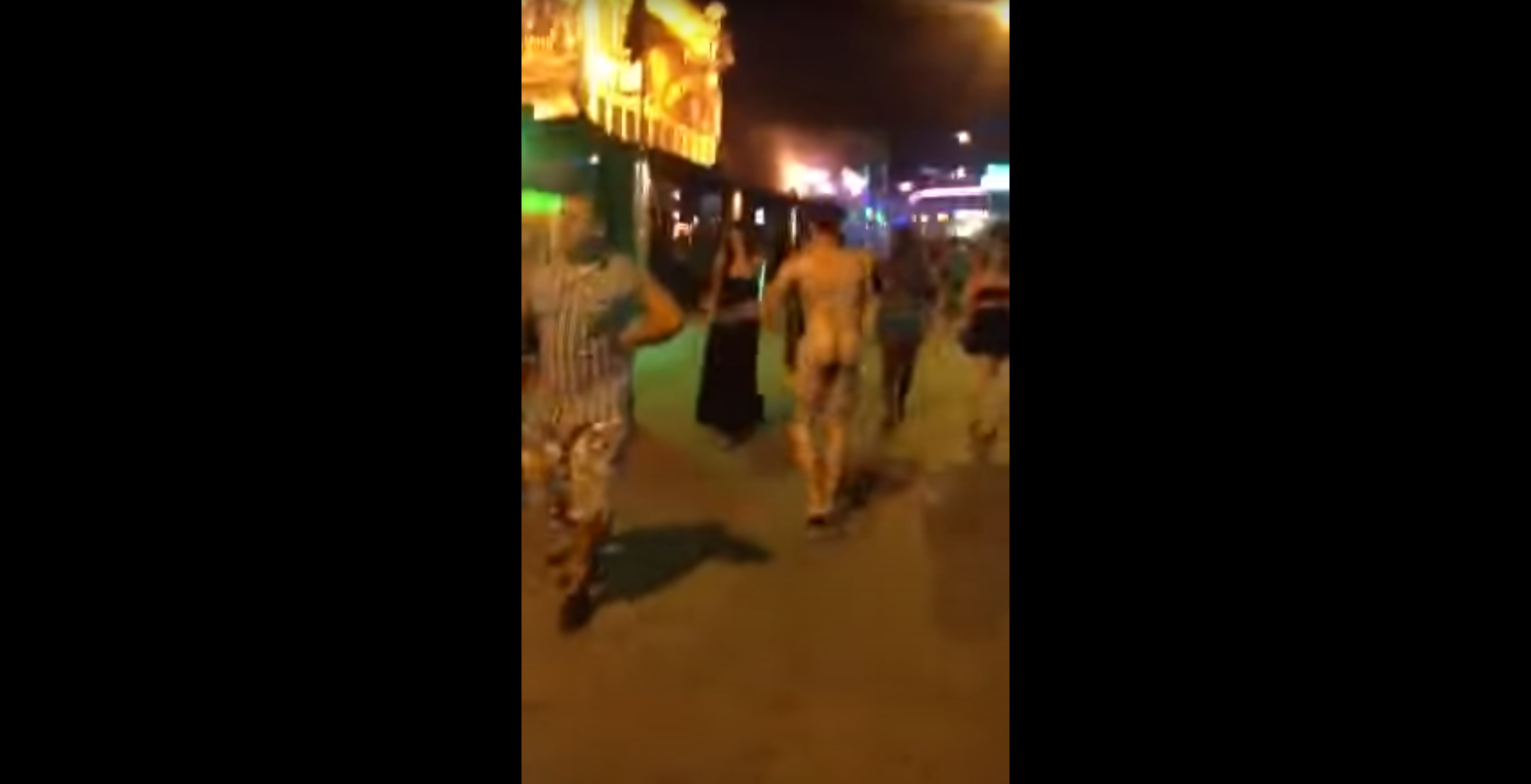 Guy dancing naked in magaluf street