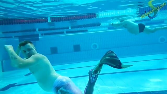 Underwater barefaced beefy gay merman
