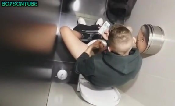 Spy Nice twink jerks dick in public  toilet