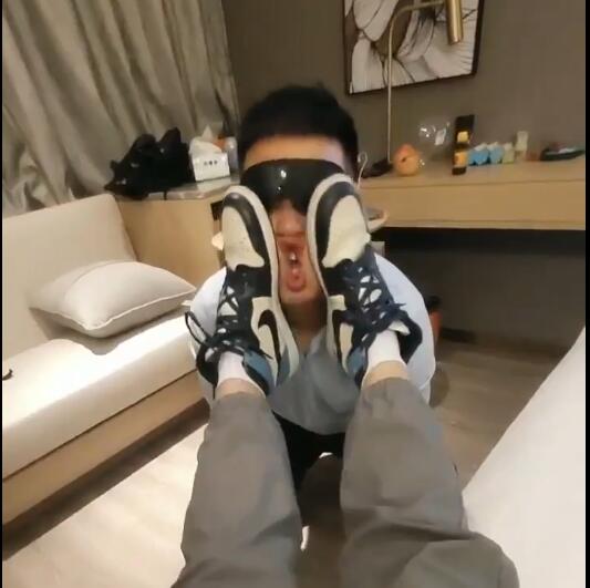 playing with face and tounge with shoes