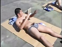 Asian boys catcing some sun and then having fun