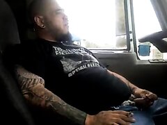 Tatted Trucker busting a nut