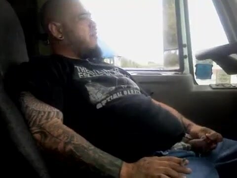 Tatted Trucker busting a nut