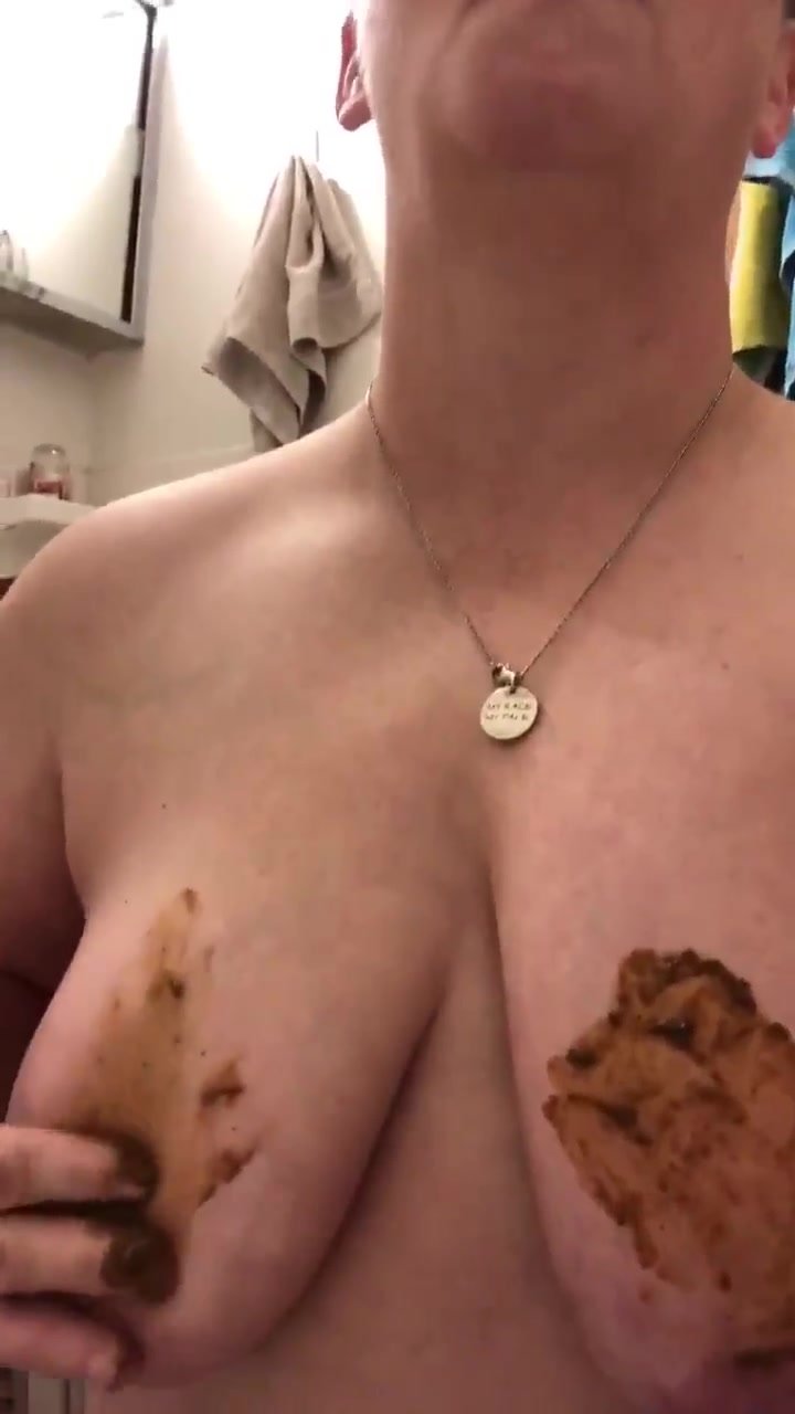 Mature whore rubbing shit on tits