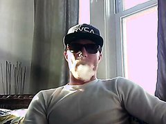 Cool smoker has a cig and plays with his hard morning boner (no cum)