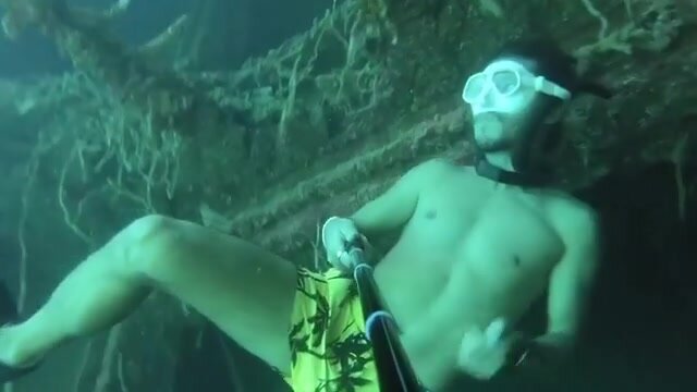 Arab freedivers breatholding underwater in sea