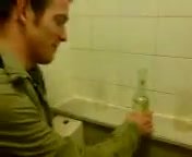 Drunk guy filmed pissing