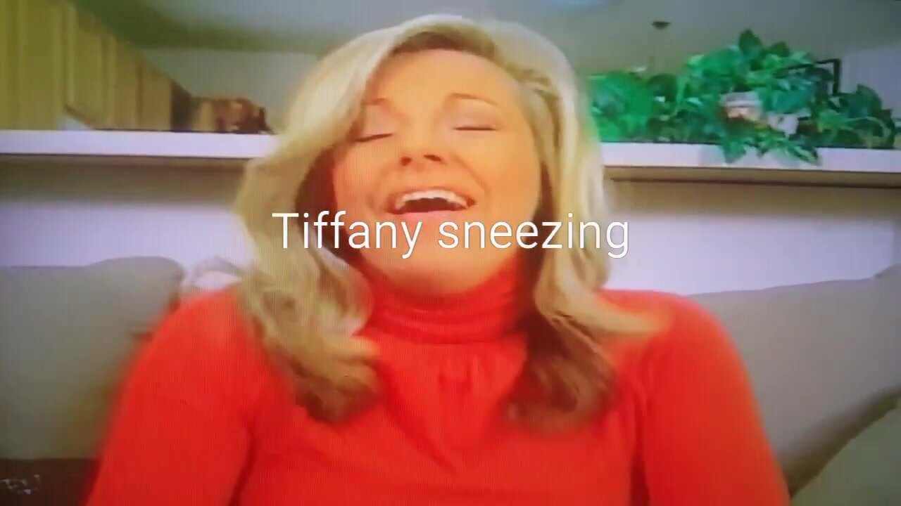 ... (blonde news anchor) sneezing