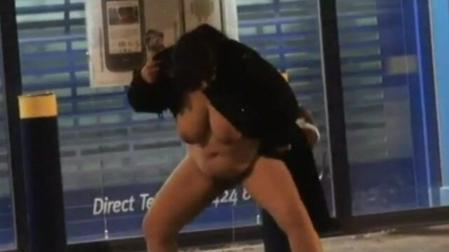 Chubby woman naked at night and she pisses by the shops