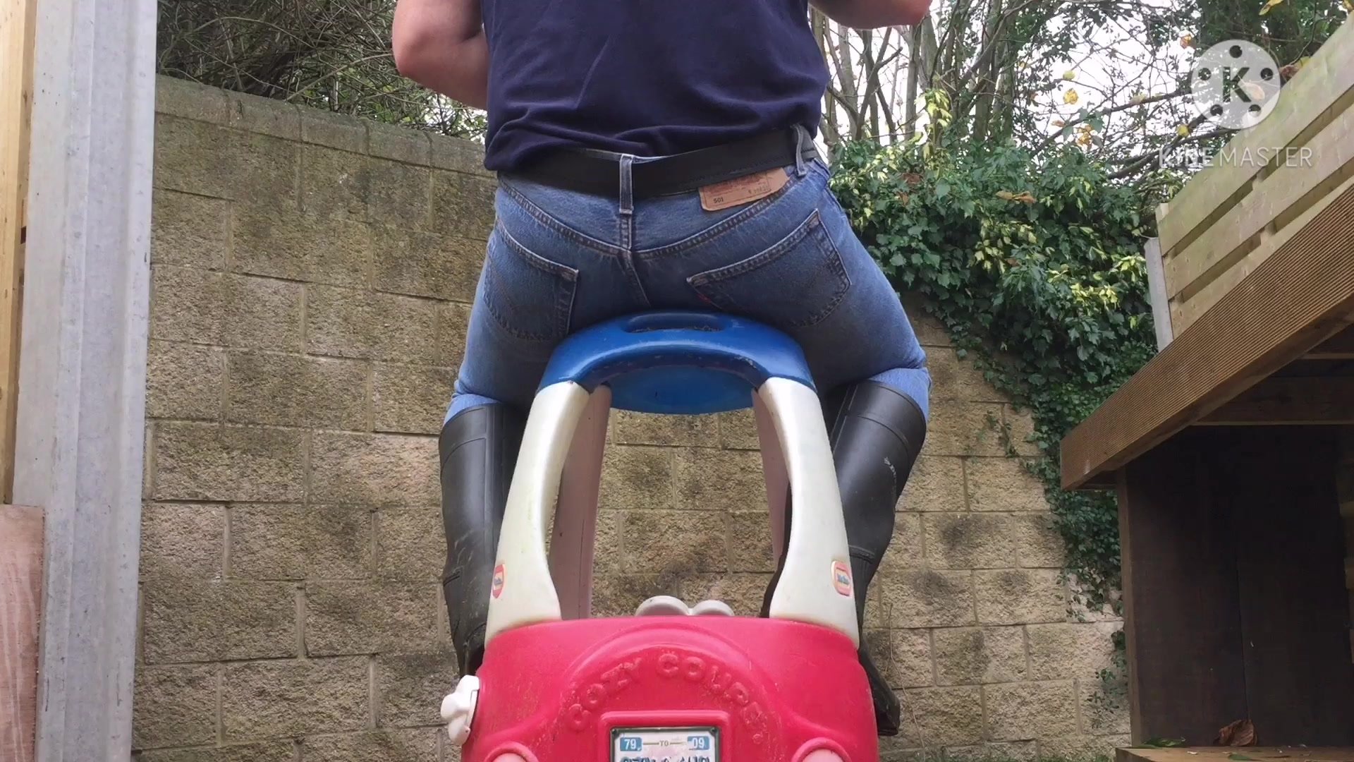 Bouncing on toy car tight levis ass - video 4