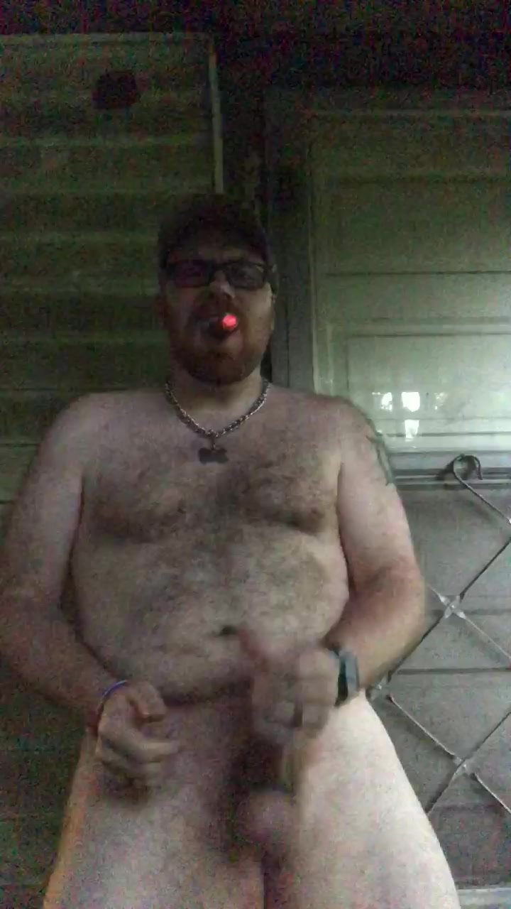 Redneck Cub Jerking while Smoking Cigar