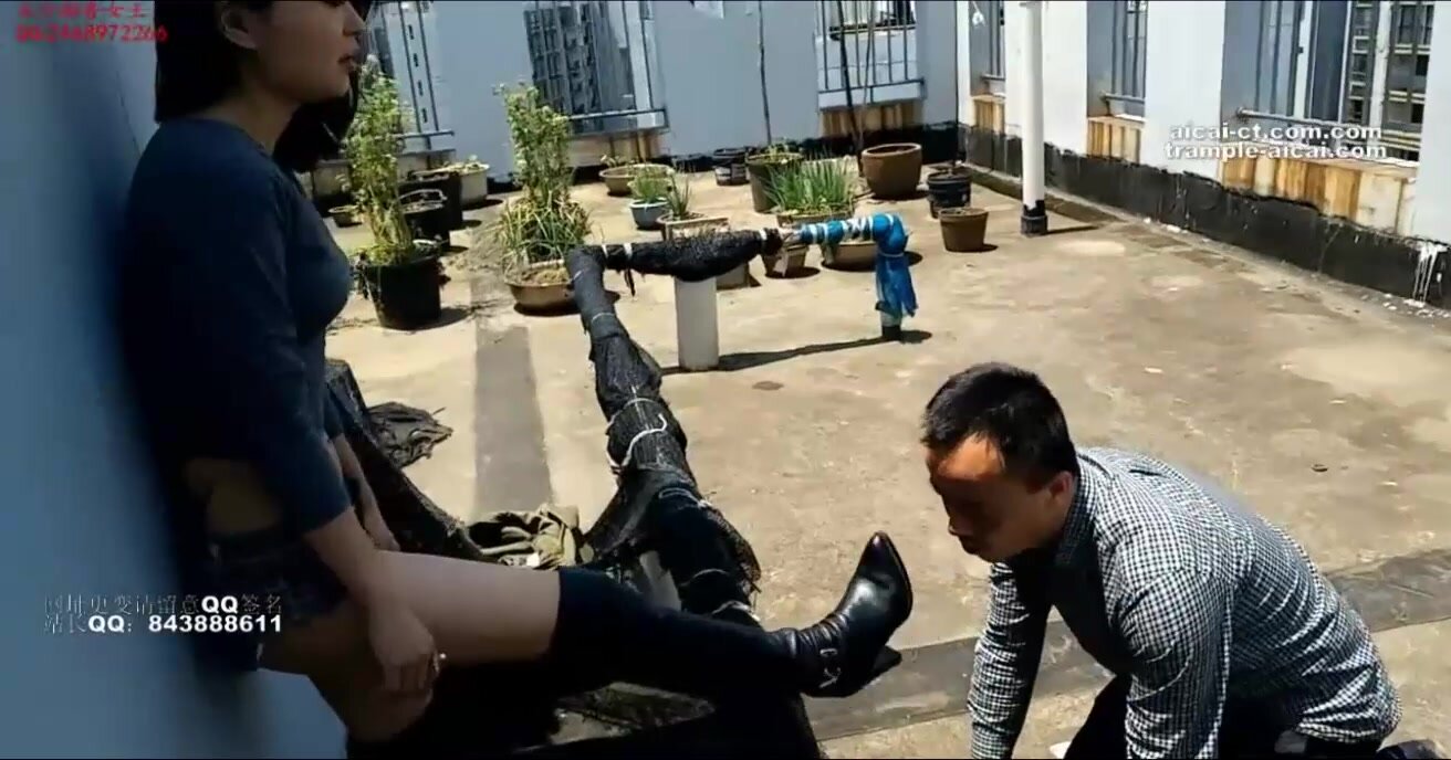 Sexy Chinese Hooker makes a man lick the dirt off Her Boots