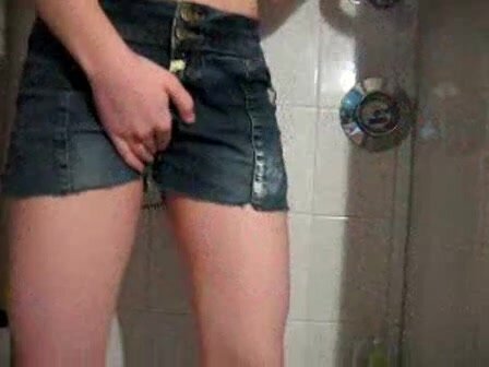Amateur girl toys, pisses and wets shorts