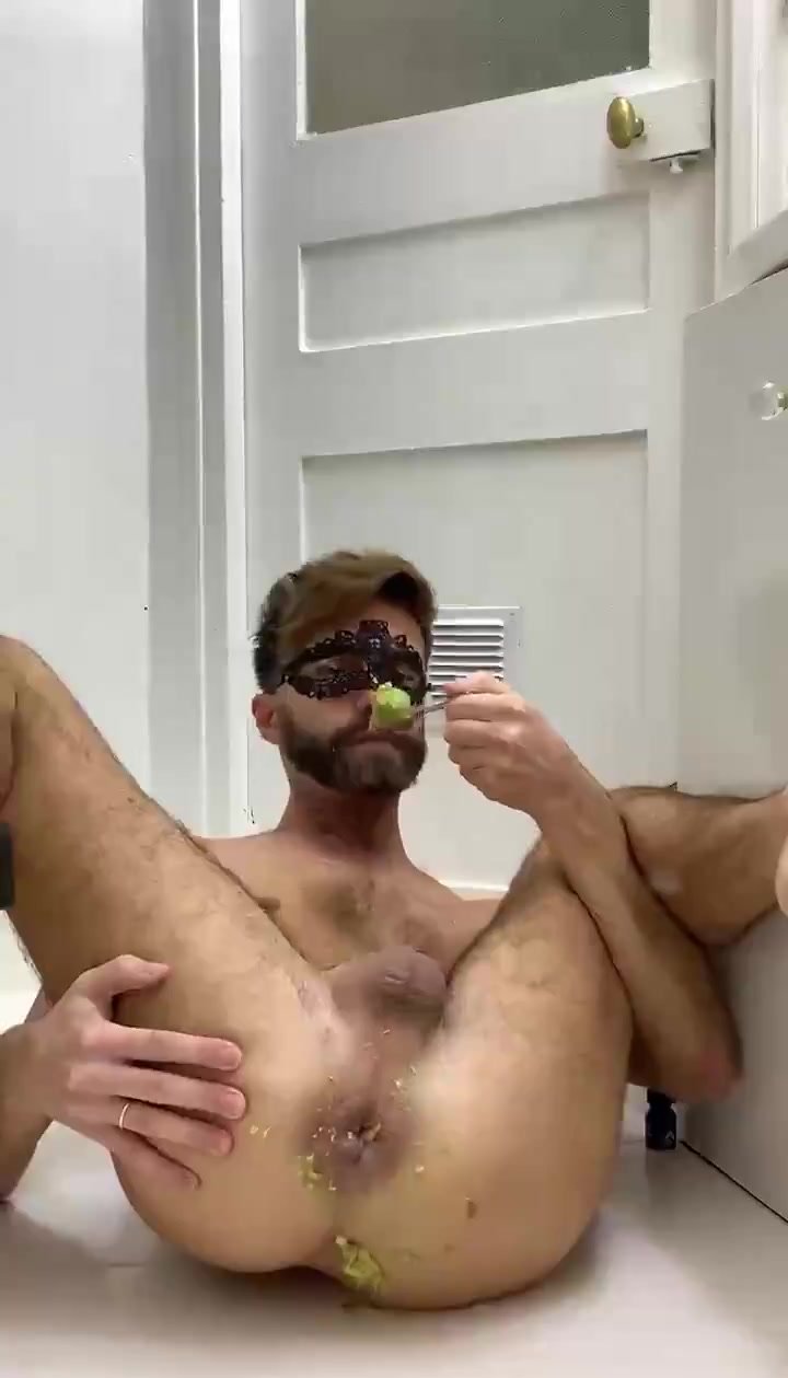 Eating avocado from his ass