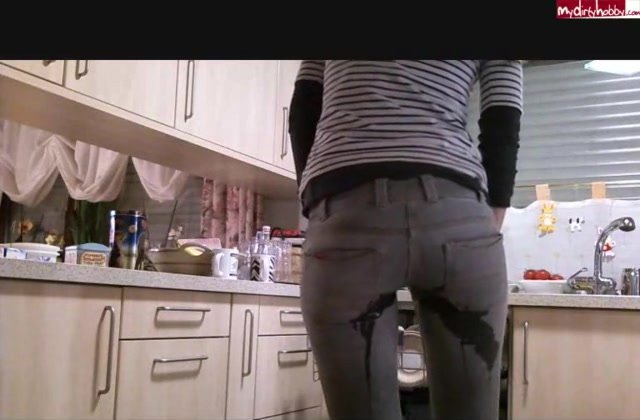 German girl piss jeans doing dishes