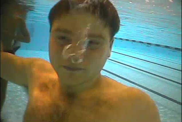 Cutie exhaling air barefaced underwater - video 2