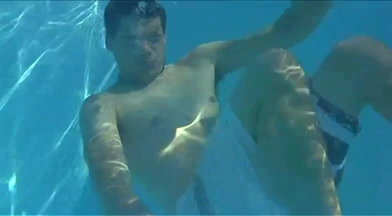 Cutie Swimming Barefaced Underwater In Pool 