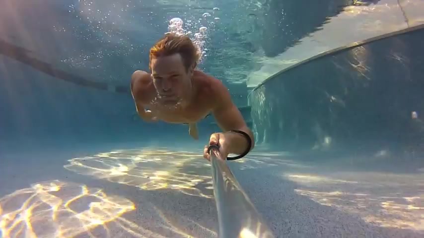 Long haired cutie breatholding underwater