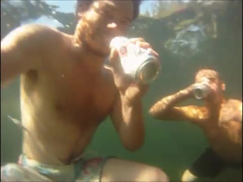 Barefaced buddies drinking underwater