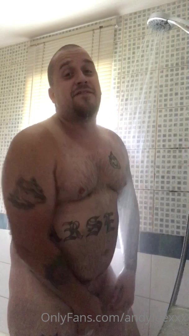 Big bear takes a shower and jerks off