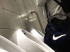 CUTE BOY PISSING AT THE URINAL 22