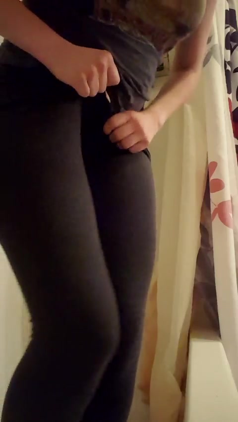 Girl pissing in black leggings.