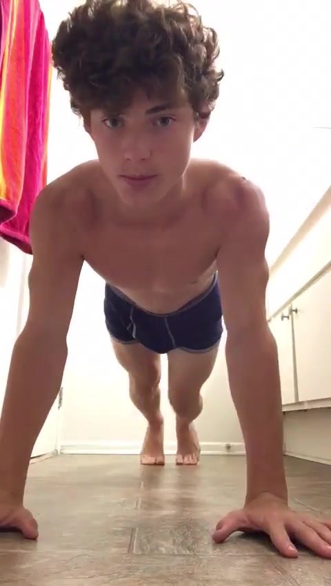 Twink in briefs does push ups