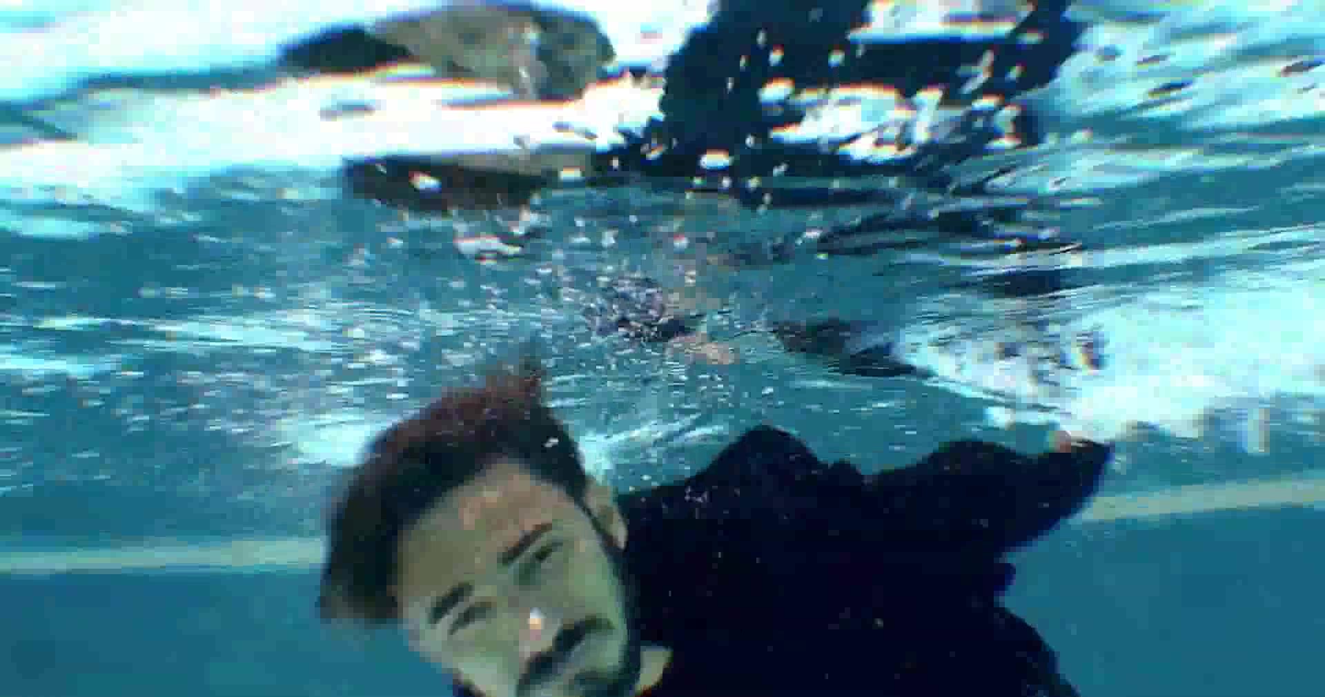 Underwater barefaced and fully clothed