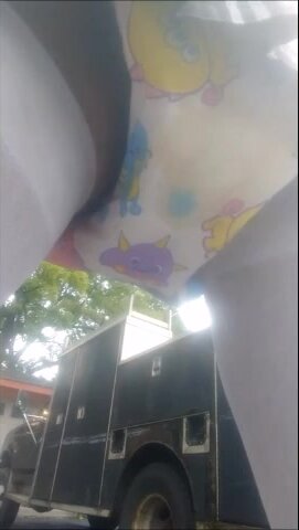 abdl wets diaper outside