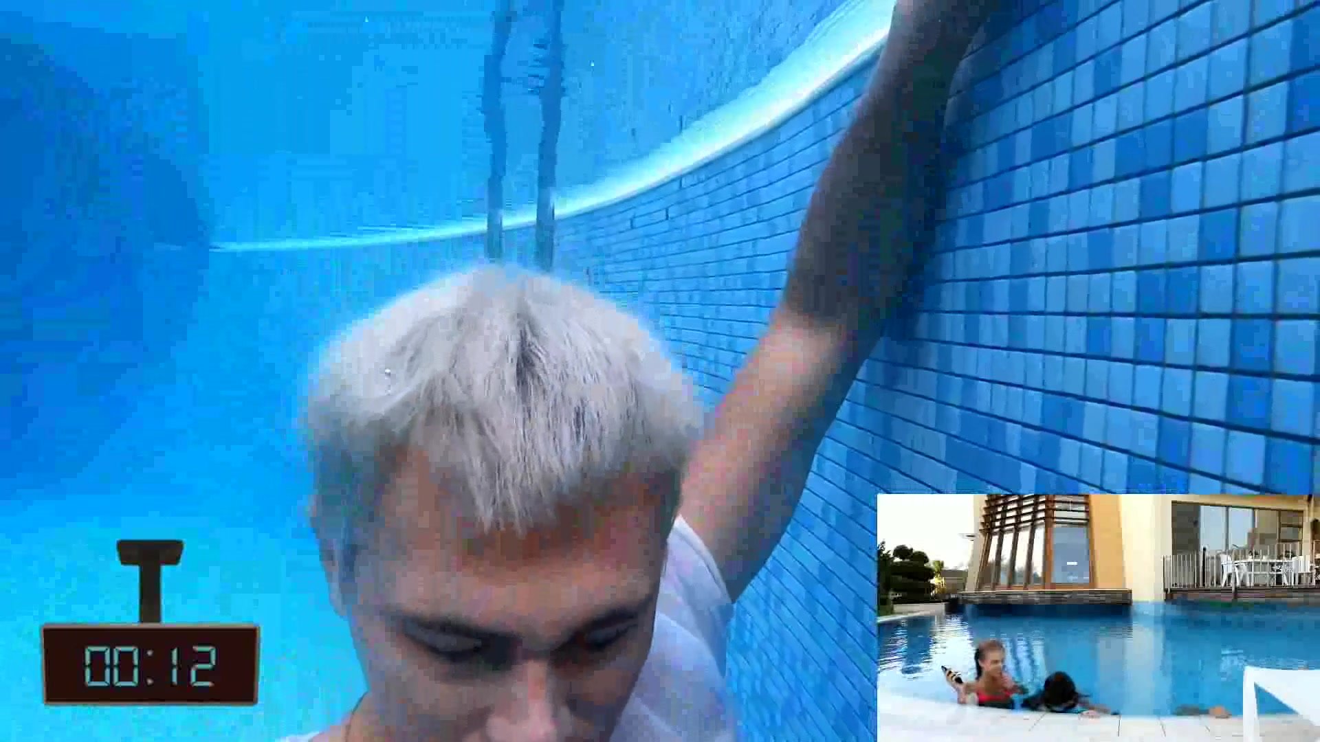 Bleached hair boy breatholds barefaced underwater for half minute