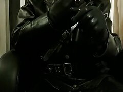 smoking in leather - video 2